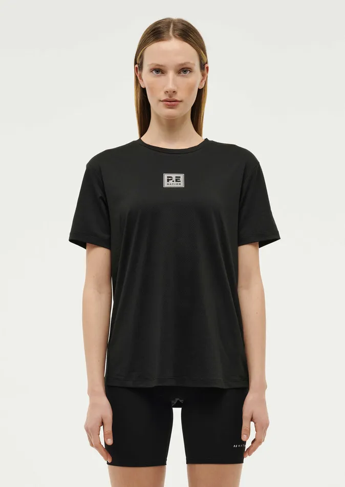 Baseline PE Nation Women CROSSOVER TEE IN BLACK