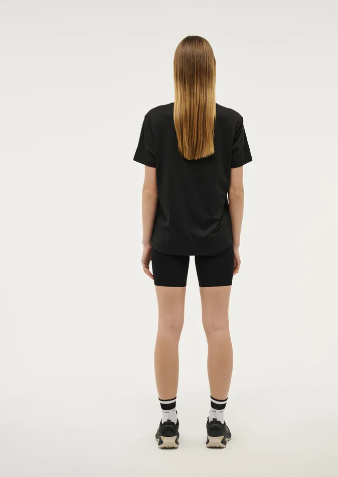 Baseline PE Nation Women CROSSOVER TEE IN BLACK
