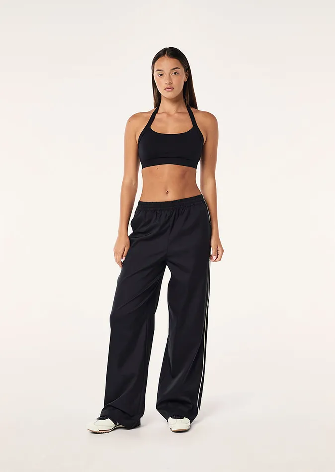 StudioSoft PE Nation Women UNWIND SPORTS BRA IN BLACK
