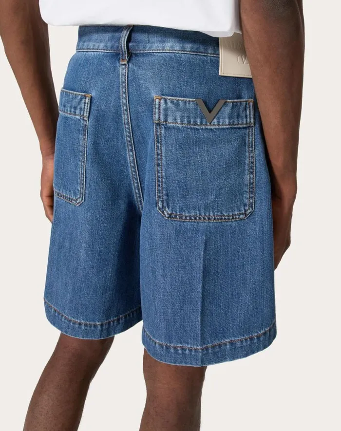 Valentino Denim Man Denim Bermuda Shorts With Metallic V Detail For Man In Denim Denim Valentino Denim Man Denim Bermuda Shorts With Metallic V Detail For Man In Denim Denim
