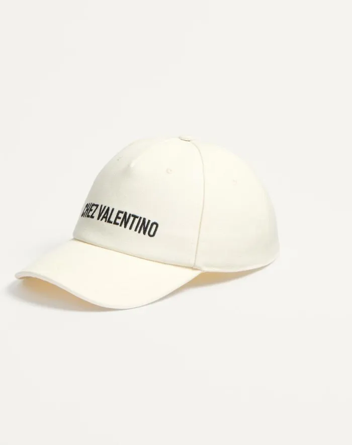 Valentino Hats And Gloves Man Chez Valentino Cotton Baseball Cap With Embroidery For Man In Ivoryblack Ivoryblack Valentino Hats And Gloves Man Chez Valentino Cotton Baseball Cap With Embroidery For Man In Ivoryblack Ivoryblack