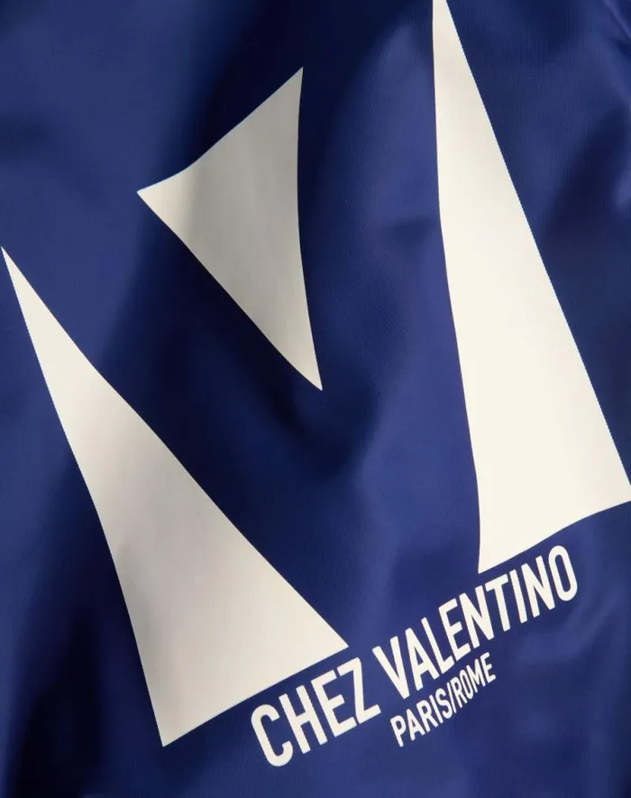 Valentino Outerwear Man Nylon Bomber Jacket With Chez Valentino Print For Man In Cobaltwhite Cobaltwhite Valentino Outerwear Man Nylon Bomber Jacket With Chez Valentino Print For Man In Cobaltwhite Cobaltwhite