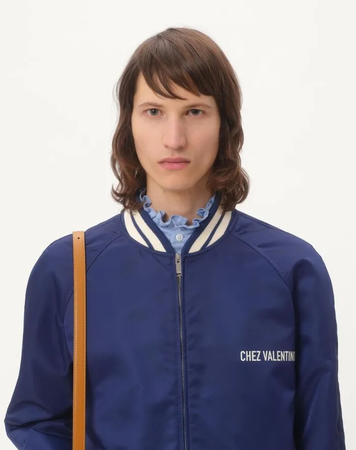 Valentino Outerwear Man Nylon Bomber Jacket With Chez Valentino Print For Man In Cobaltwhite Cobaltwhite Valentino Outerwear Man Nylon Bomber Jacket With Chez Valentino Print For Man In Cobaltwhite Cobaltwhite