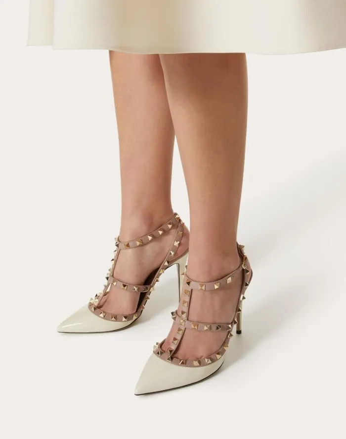 Valentino Pumps Woman Patent Rockstud Caged Pump 100mm For Woman In Ivorypoudre Ivorypoudre Valentino Pumps Woman Patent Rockstud Caged Pump 100mm For Woman In Ivorypoudre Ivorypoudre