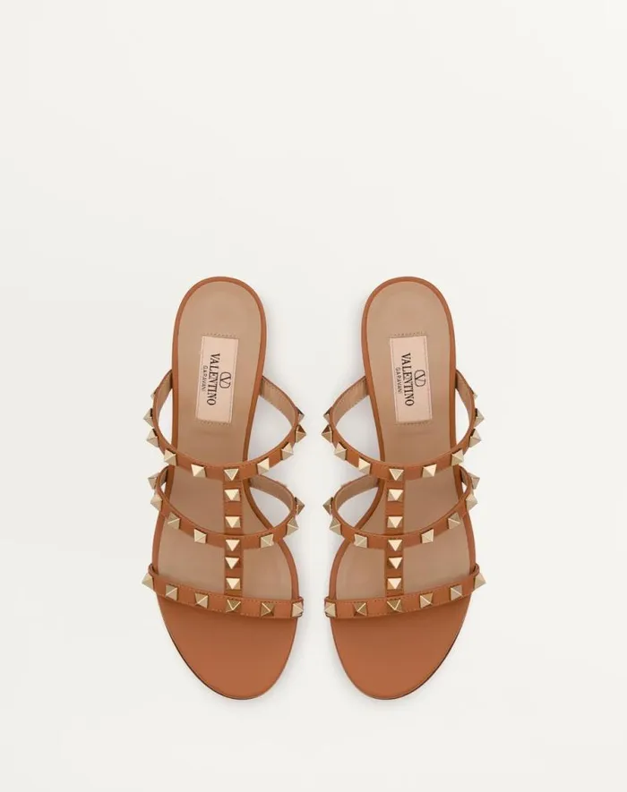 Valentino Sandals Woman Rockstud Calfskin Leather Slide Sandal 60 Mm For Woman In Poudre Poudre Valentino Sandals Woman Rockstud Calfskin Leather Slide Sandal 60 Mm For Woman In Poudre Poudre