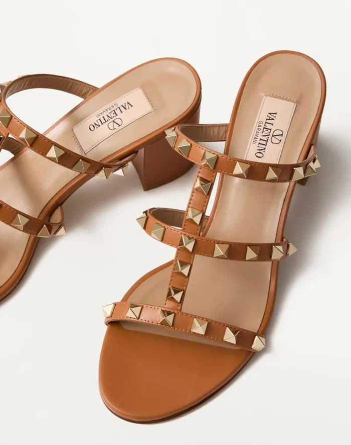 Valentino Sandals Woman Rockstud Calfskin Leather Slide Sandal 60 Mm For Woman In Poudre Poudre Valentino Sandals Woman Rockstud Calfskin Leather Slide Sandal 60 Mm For Woman In Poudre Poudre