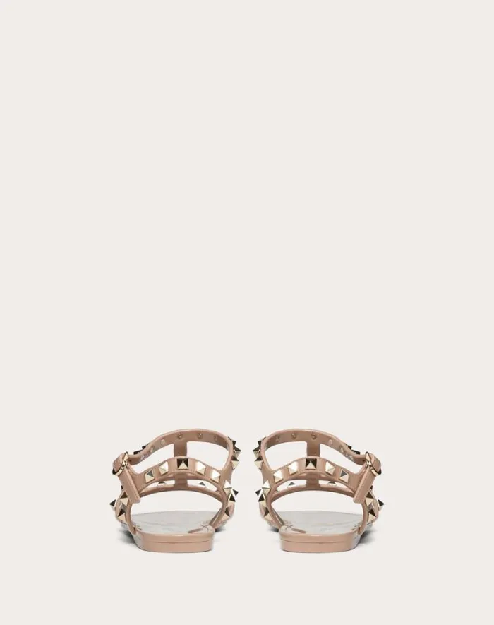 Valentino Sandals Woman Rockstud Flat Rubber Sandal For Woman In Poudre Poudre