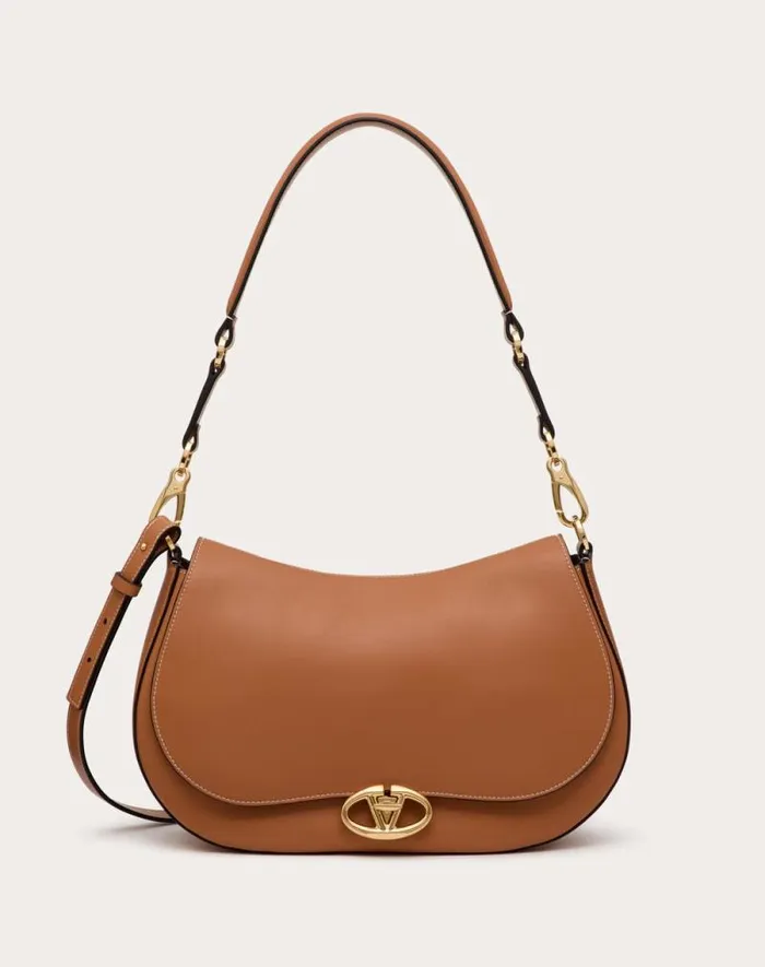 Valentino Shoulder Bags Woman Valentino Garavani Ohval Medium Shoulder Bag In Nappa Calfskin For Woman In Almond Almond Valentino Shoulder Bags Woman Valentino Garavani Ohval Medium Shoulder Bag In Nappa Calfskin For Woman In Almond Almond