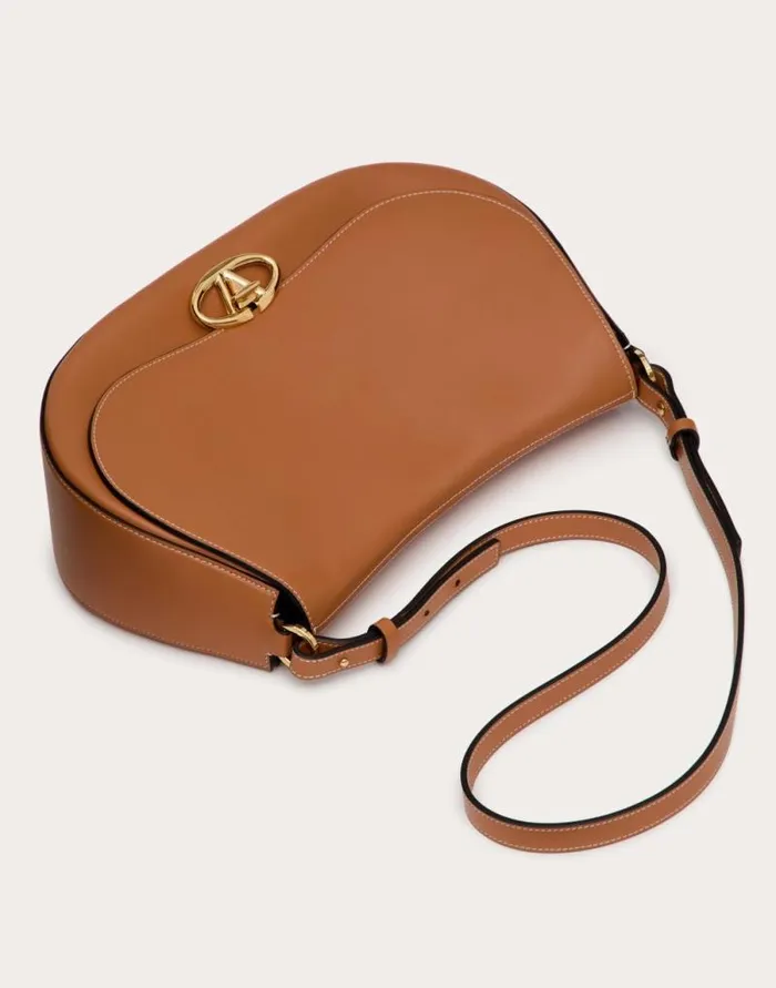 Valentino Shoulder Bags Woman Valentino Garavani Ohval Medium Shoulder Bag In Nappa Calfskin For Woman In Almond Almond Valentino Shoulder Bags Woman Valentino Garavani Ohval Medium Shoulder Bag In Nappa Calfskin For Woman In Almond Almond