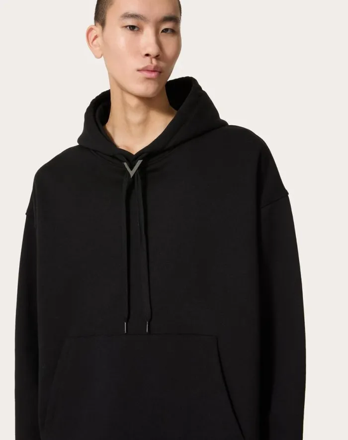 Valentino Tshirts And Sweatshirts Man Cotton Hooded Sweatshirt With Metallic V Detail For Man In Grey Grey Valentino Tshirts And Sweatshirts Man Cotton Hooded Sweatshirt With Metallic V Detail For Man In Grey Grey