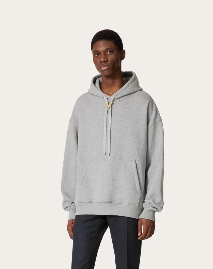 Valentino Tshirts And Sweatshirts Man Cotton Hooded Sweatshirt With Metallic V Detail For Man In Grey Grey Valentino Tshirts And Sweatshirts Man Cotton Hooded Sweatshirt With Metallic V Detail For Man In Grey Grey