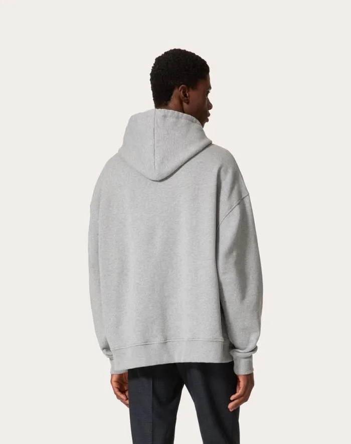 Valentino Tshirts And Sweatshirts Man Cotton Hooded Sweatshirt With Metallic V Detail For Man In Grey Grey Valentino Tshirts And Sweatshirts Man Cotton Hooded Sweatshirt With Metallic V Detail For Man In Grey Grey